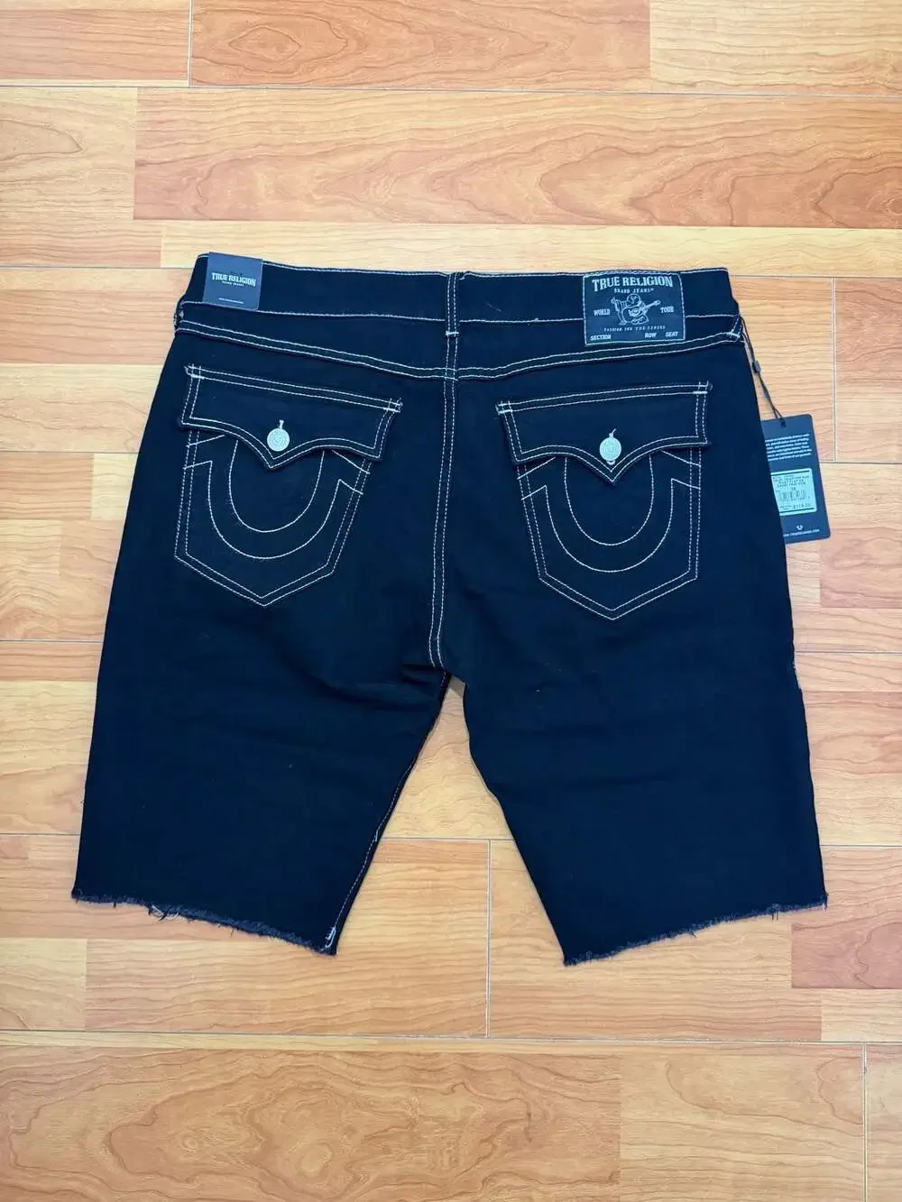 True Religion Ricky Relaxed Straight Flap Denim Shorts with Fray Hem in Rinse